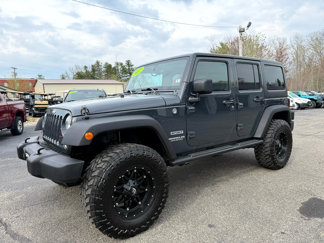 Used 2017 Jeep Wrangler Unlimited Sport w/ Mopar Black Appearance Group image 1