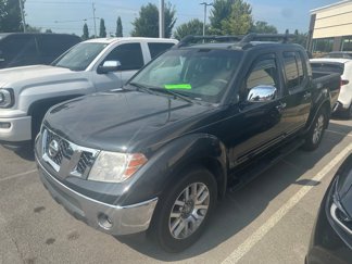 Used 2010 Nissan Frontier LE image 1