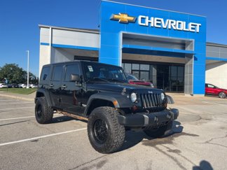 Used 2011 Jeep Wrangler Unlimited Sport image 1