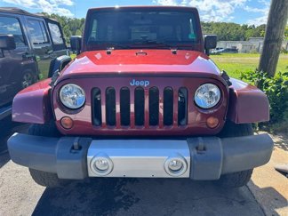 Used 2010 Jeep Wrangler Unlimited Sahara w/ Dual Top Group image 1