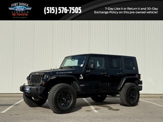 Used 2010 Jeep Wrangler Unlimited Rubicon w/ Dual Top Group image 1