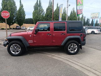 Used 2013 Jeep Wrangler Unlimited Sport image 1