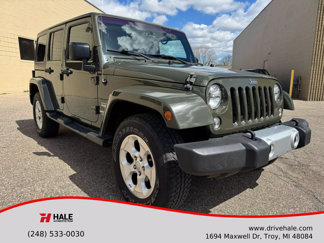 Used 2015 Jeep Wrangler Unlimited Sahara image 1