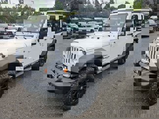 Used 2013 Jeep Wrangler Unlimited Sport image 1