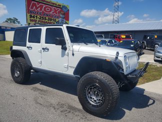 Used 2013 Jeep Wrangler Unlimited Sport image 1