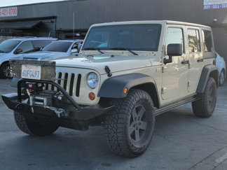 Used 2011 Jeep Wrangler Unlimited Sport image 1