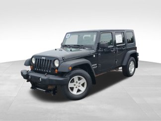 Used 2010 Jeep Wrangler Unlimited Sport image 1
