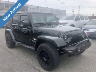 Used 2012 Jeep Wrangler Unlimited Sahara w/ Dual Top Group image 1