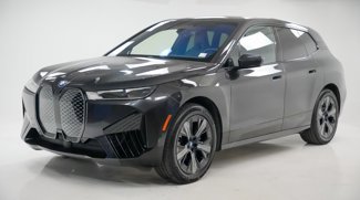 Used 2024 BMW iX xDrive50 w/ Sport Package image 1