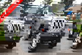 Used 2013 Jeep Wrangler Sport image 1