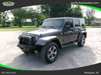 Used 2014 Jeep Wrangler Unlimited Sahara image 1