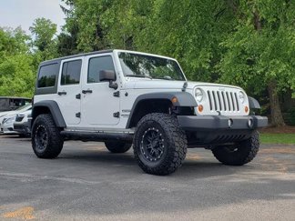 Used 2013 Jeep Wrangler Unlimited Sport image 1