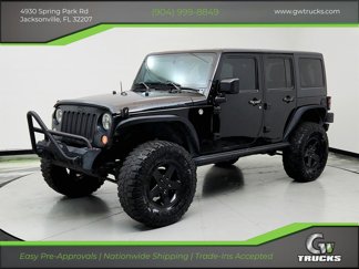 Used 2016 Jeep Wrangler Unlimited Sport image 1