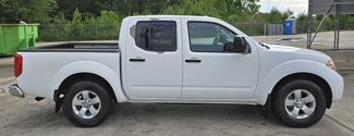 Used 2012 Nissan Frontier SV w/ SV Premium Utility Pkg image 1