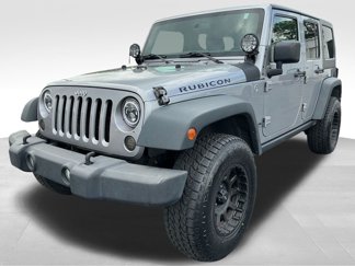 Used 2013 Jeep Wrangler Unlimited Rubicon w/ Dual Top Group image 1