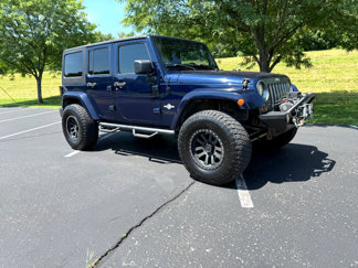 Used 2013 Jeep Wrangler Unlimited Sport image 1