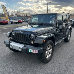 Used 2015 Jeep Wrangler Unlimited Sahara w/ Dual Top Group image 1