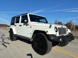 Used 2016 Jeep Wrangler Unlimited Sahara image 1
