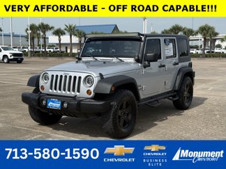 Used 2010 Jeep Wrangler Unlimited Sport image 1