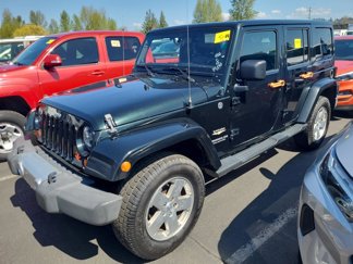 Used 2012 Jeep Wrangler Unlimited Sahara image 1