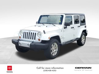 Used 2013 Jeep Wrangler Unlimited Sahara w/ Dual Top Group image 1