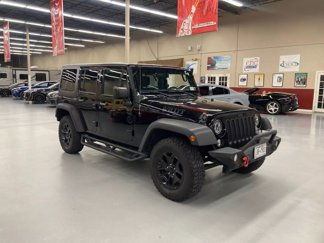 Used 2016 Jeep Wrangler Unlimited Sport image 1