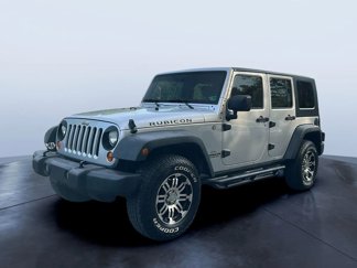 Used 2007 Jeep Wrangler Unlimited Rubicon w/ Dual Top Group image 1