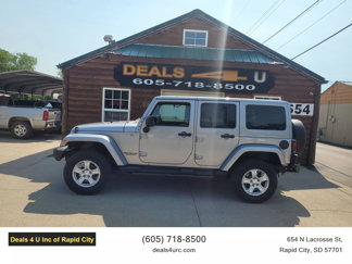 Used 2013 Jeep Wrangler Unlimited Sahara image 1