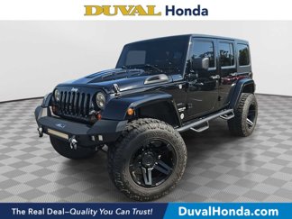 Used 2013 Jeep Wrangler Unlimited Sport image 1
