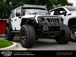 Used 2013 Jeep Wrangler Unlimited Sahara w/ Max Tow Pkg image 1