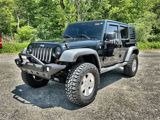 Used 2012 Jeep Wrangler Unlimited Sport image 1