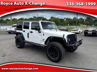 Used 2014 Jeep Wrangler Unlimited Sport image 1