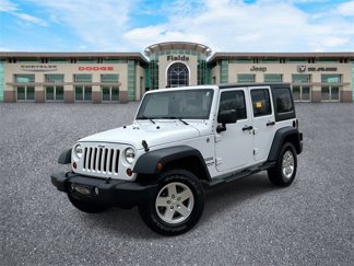 Used 2013 Jeep Wrangler Unlimited Sport image 1