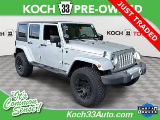 Used 2010 Jeep Wrangler Unlimited Sahara w/ Dual Top Group image 1