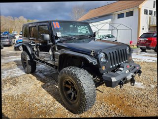Used 2018 Jeep Wrangler Unlimited Sahara image 1