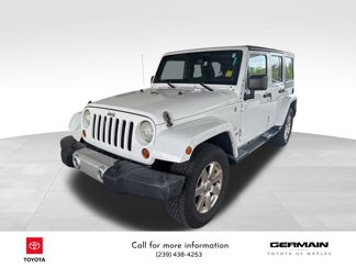 Used 2013 Jeep Wrangler Unlimited Sahara w/ Dual Top Group image 1