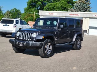 Used 2016 Jeep Wrangler Unlimited Sahara w/ Connectivity Group image 1