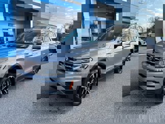 Used 2021 Volkswagen Tiguan SE w/ Panoramic Sunroof Package image 1