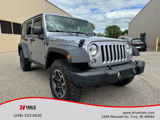 Used 2014 Jeep Wrangler Unlimited Rubicon w/ Dual Top Group image 1