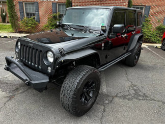 Used 2016 Jeep Wrangler Unlimited Sport image 1