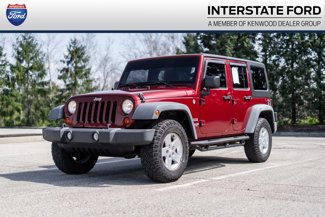 Used 2011 Jeep Wrangler Unlimited Sport image 1