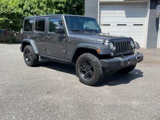 Used 2017 Jeep Wrangler Unlimited Black Bear image 1