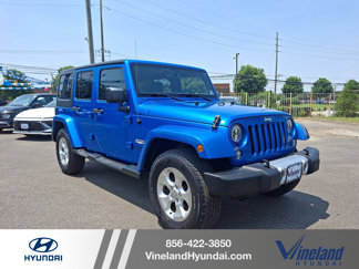 Used 2015 Jeep Wrangler Unlimited Sahara w/ Dual Top Group image 1