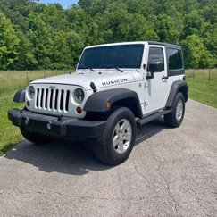 Used 2012 Jeep Wrangler Rubicon w/ Dual Top Group image 1