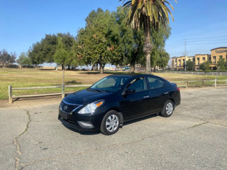 Used 2015 Nissan Versa SV image 1