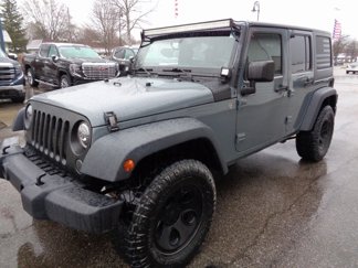 Used 2014 Jeep Wrangler Unlimited Sahara w/ Max Tow Package image 1