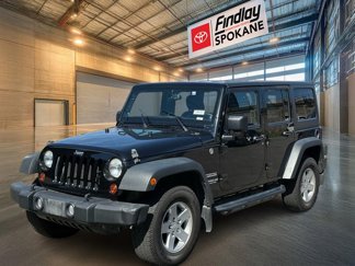 Used 2013 Jeep Wrangler Unlimited Sport image 1