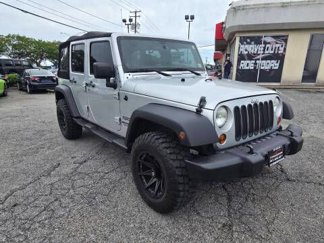 Used 2012 Jeep Wrangler Unlimited Sport image 1