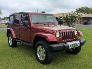 Used 2011 Jeep Wrangler Unlimited Sahara w/ Mopar Chrome Edition Group image 1