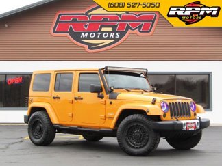 Used 2013 Jeep Wrangler Unlimited Sahara w/ Dual Top Group image 1